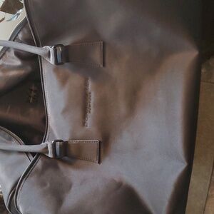 DKNY black nylon, lined, standard size Duffle Bag lightly used